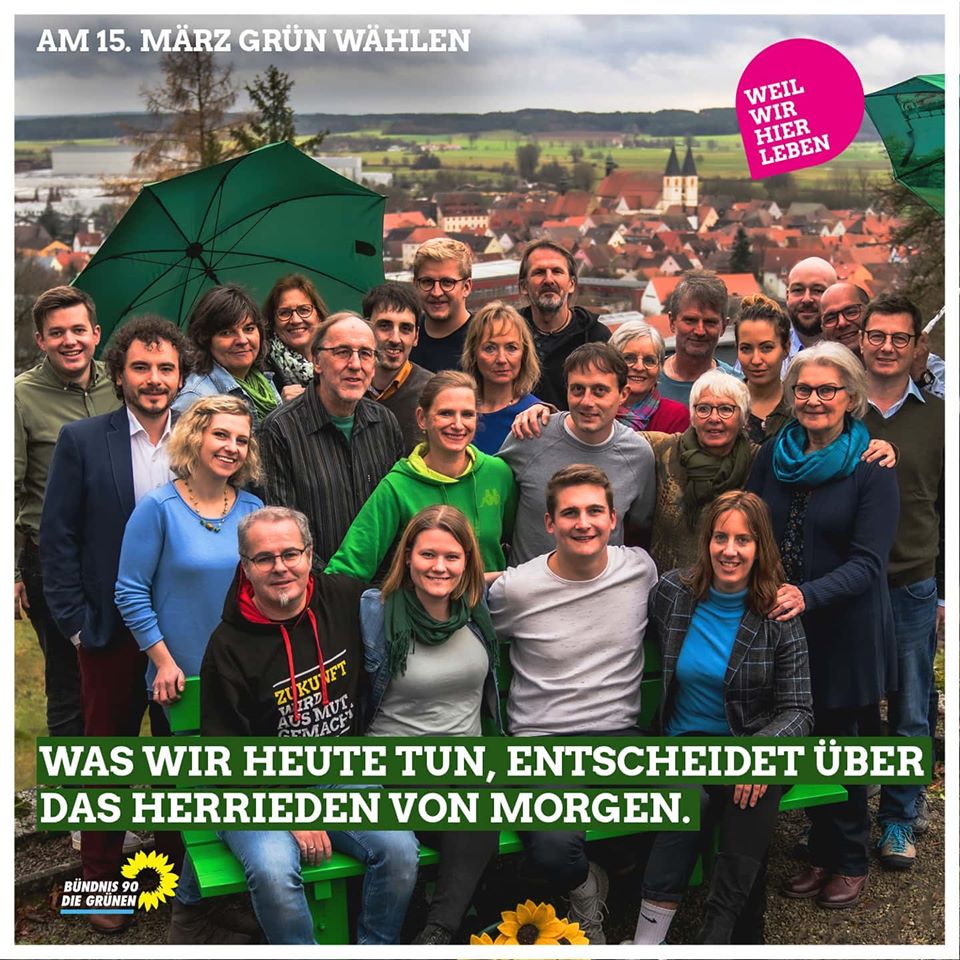 Kandidat*innen mit Motto