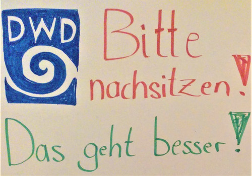 Demo-Plakat mit der Aufschrift "DWD bitte nachsitzen! Das geht besser!" Plakat und Foto: Uli Grüber