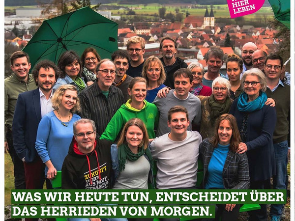 Kandidat*innen mit Motto
